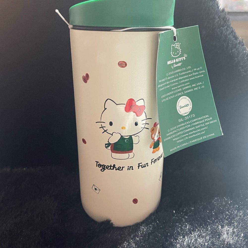New Starbucks Sanrio Hello Kitty Cream Travel Mug with Green Lid